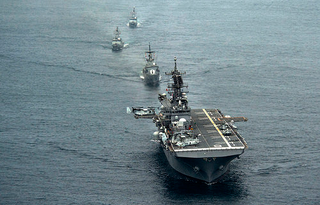 Illustration for article titled USS America: The Navy's Newest Flattop Can't Decide What The Hell It Is